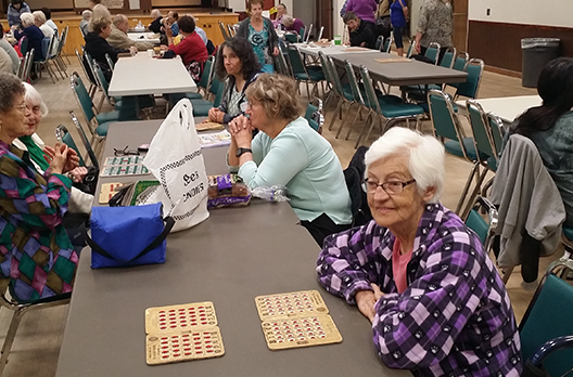Seniors at bingo community event